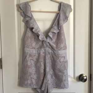 The Jersey Diaries Floral Purple Romper NWOT